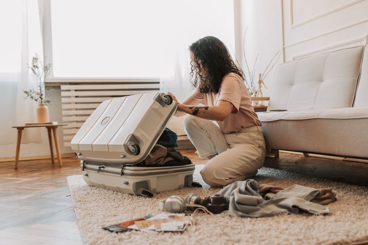 Traveler preparing luggage for a trip